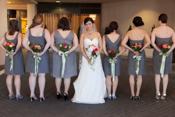grey bridesmaids green bouquets